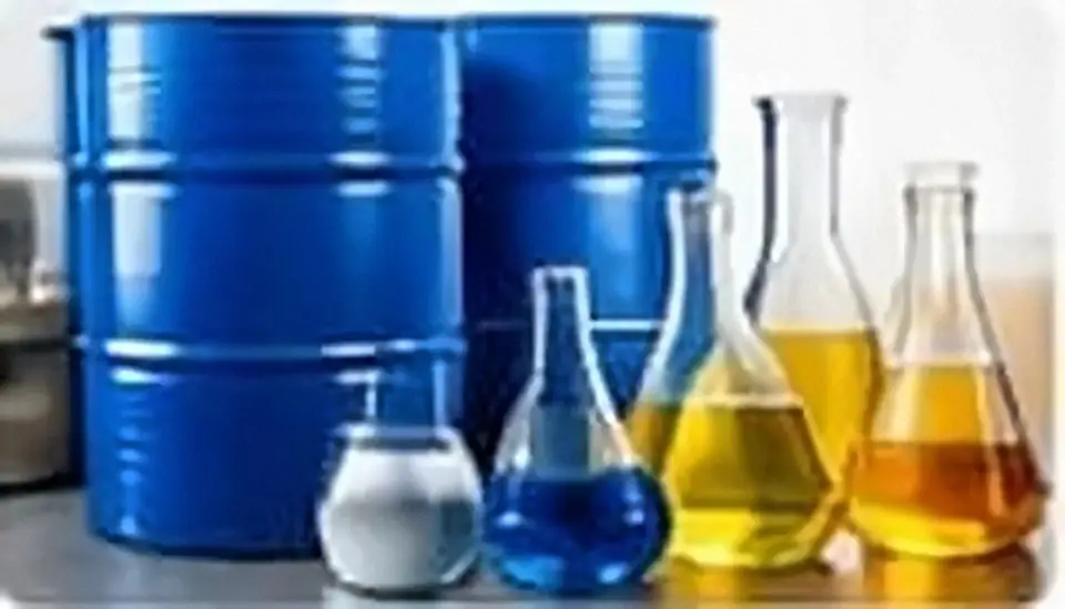 Blue chemical drums and laboratory flasks